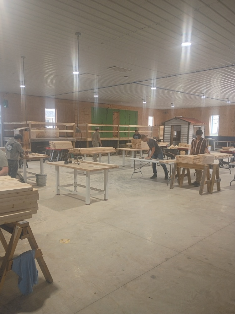 students building beds 