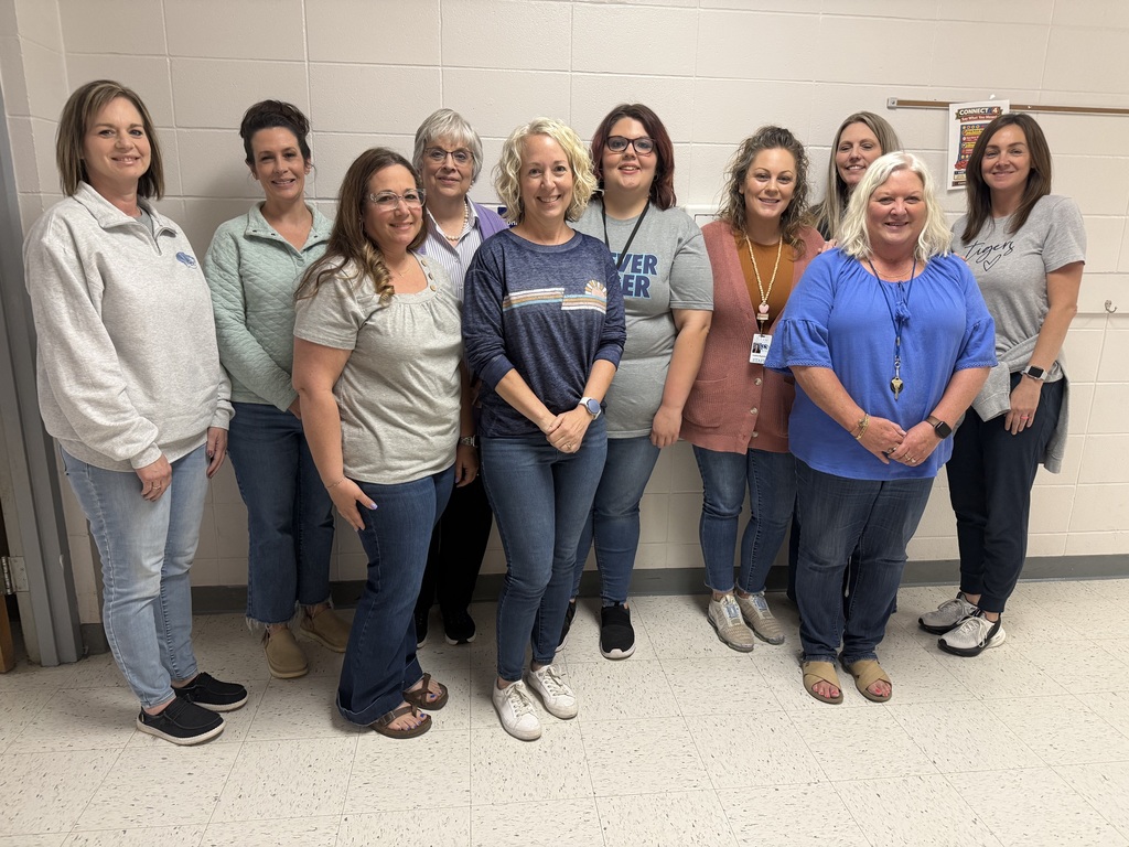 Mandi Conway, Monica Lyle, Kathy Grover, Mystee Swank, Heather Maglothin, Jody Heavin, Jennifer Bass, Heather Johnson, Jennifer Rensch, and Carmen Vaughan gather in recognition of being named Teachers and Staff Members of the month from the 25-26 school year.