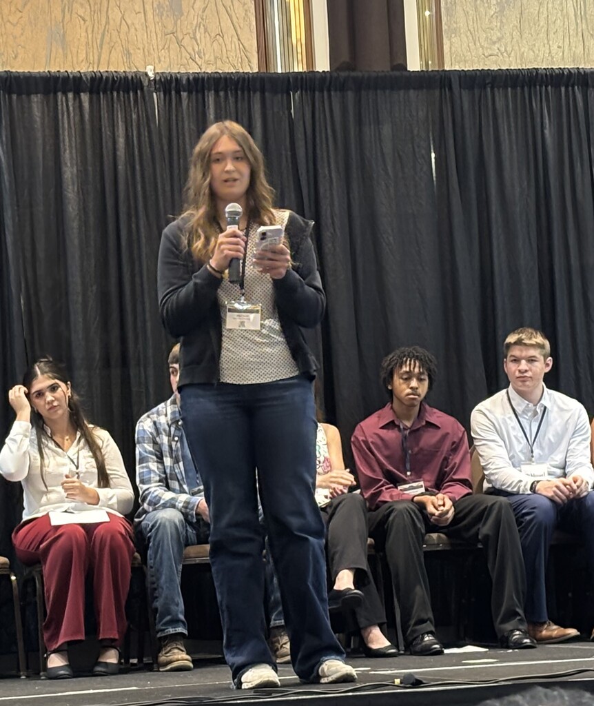 Abbi giving her speech on stage