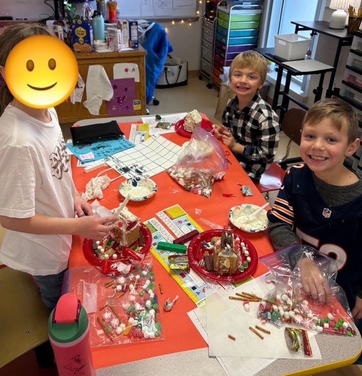 students making graham cracker houses.