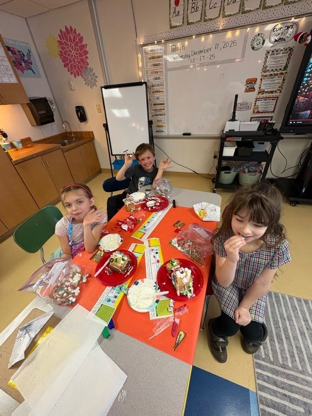 students making graham cracker houses.