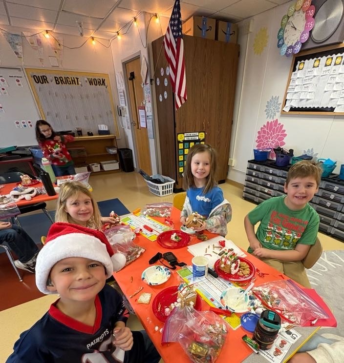 students making graham cracker houses.
