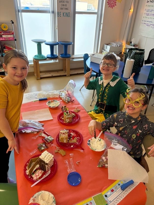 students making graham cracker houses.