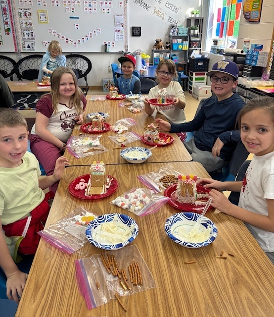 students making graham cracker houses.