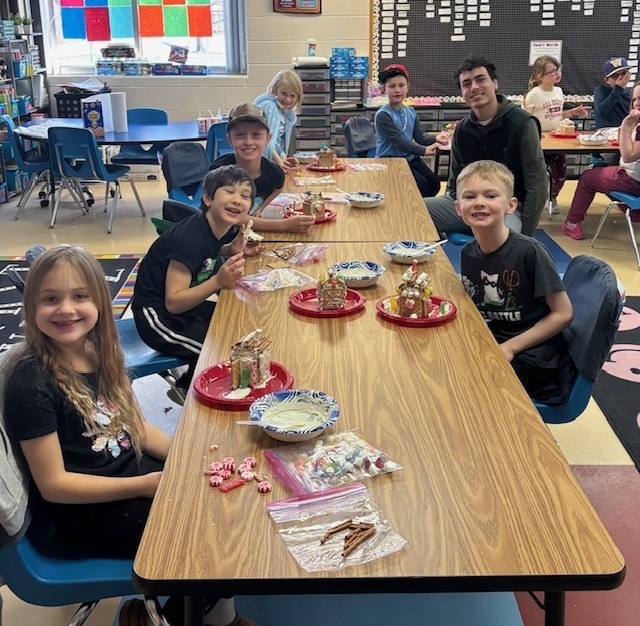 students making graham cracker houses.