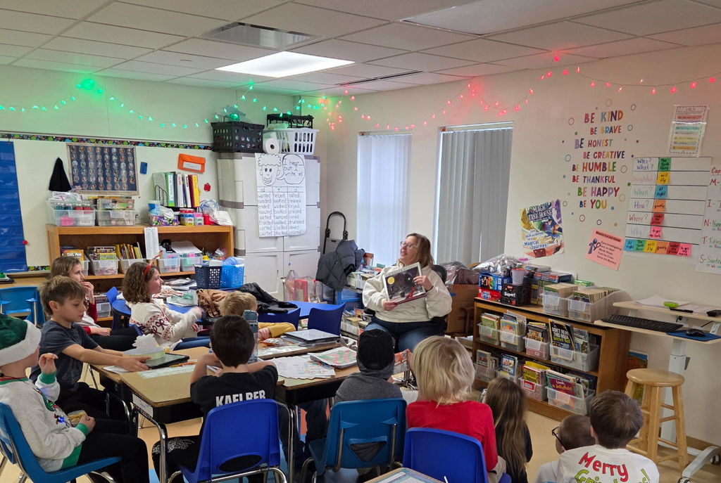 Mrs. Luengen reading to students