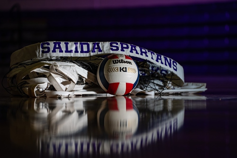 Gym floor with Salida Spartans volleyball and net