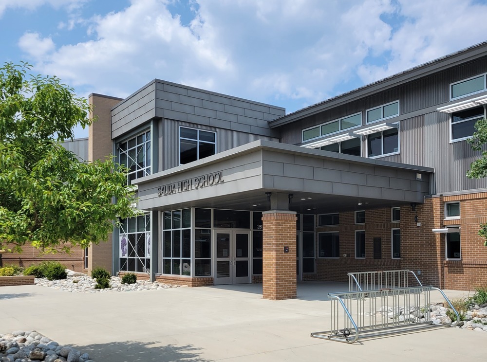 Main Entrance to Salida High School with empty bike rack