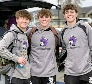 2026 SHS Wrestlers Ready for the State Tournament - Three male athletes in Spartan hoodies