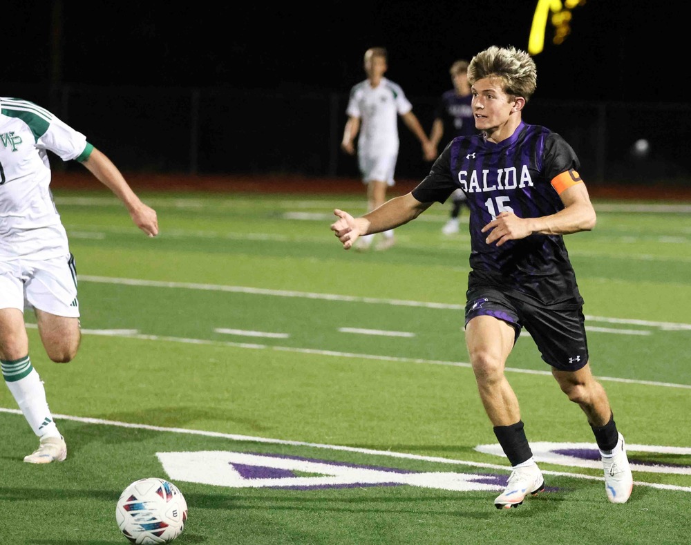 SHS Boys Soccer Player on the turf