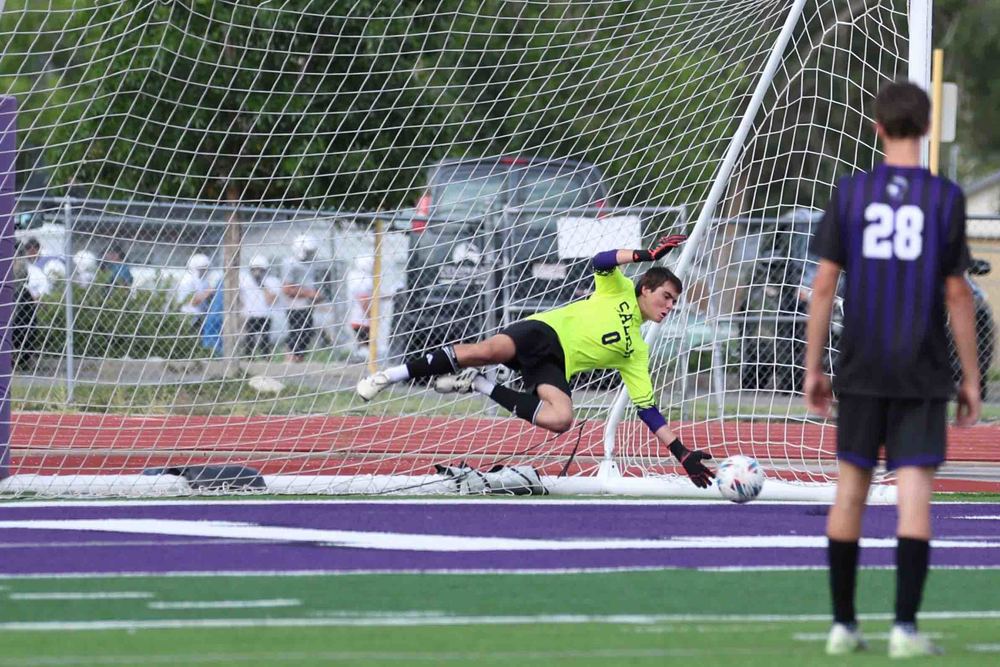 Salida Boys Soccer Goalie  stops the ball