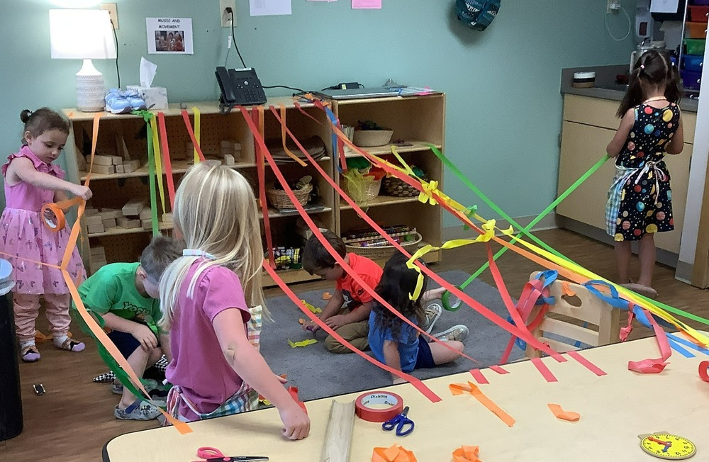 SECC students play with colorful masking tape