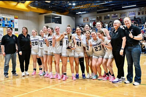 2026 Girls' Varsity Basketball Team with their TriPeaks League Trophy