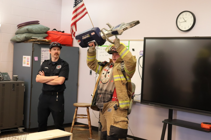 Student trying on bunker gear!