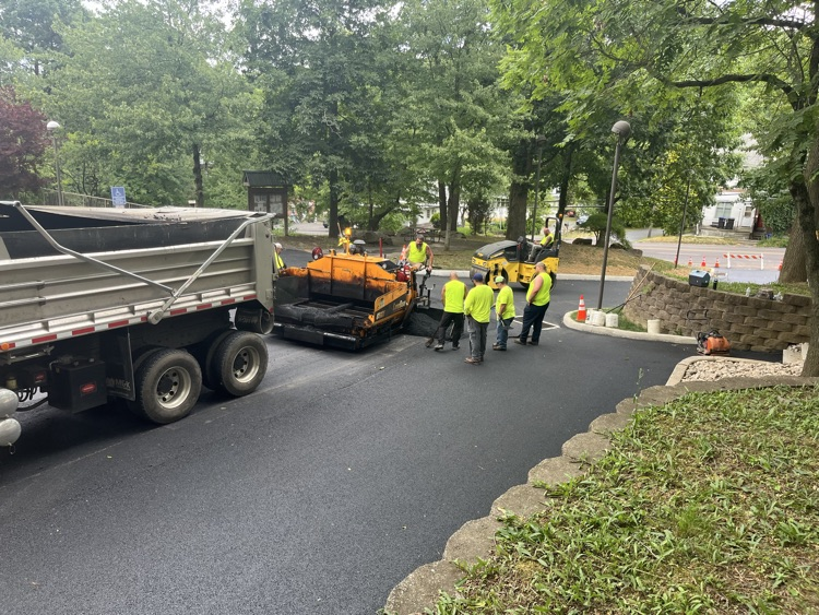 DPW paving the parking lot 