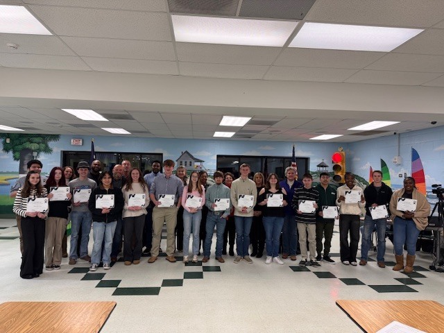 Group photo of students with perfect EOC scores