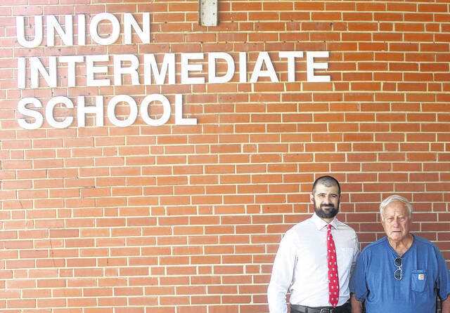 UIS Principal and Terry Williams  