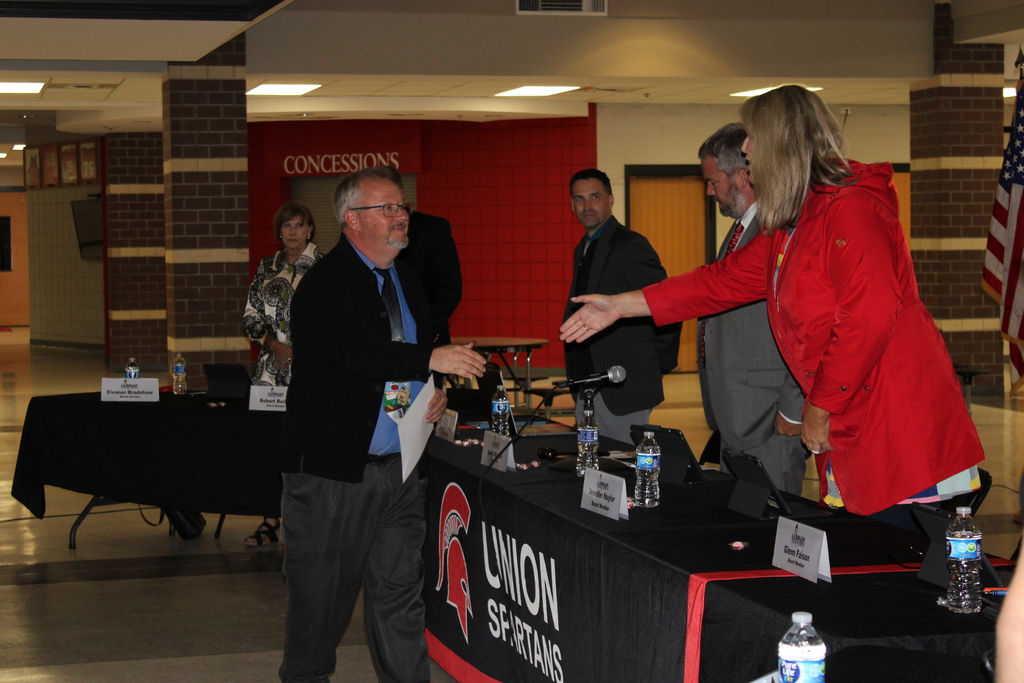 Michael Gidden from HMS getting recognized at Board Meeting