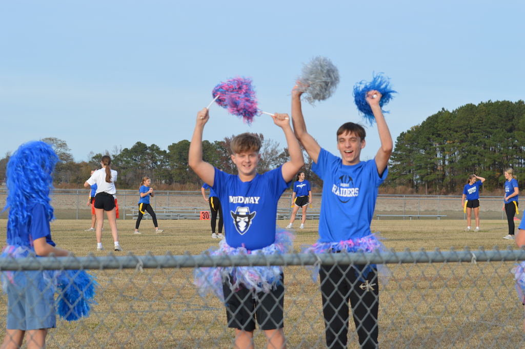 Jacob Scally and Andrei Grieser cheering on the teams.