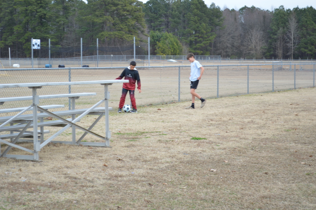 Playing soccer outside