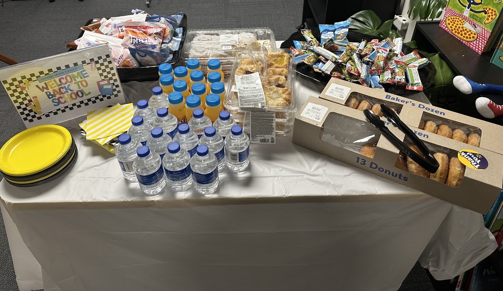 table with breakfast foods and drinks