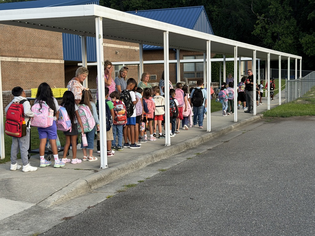 Teachers welcoming students 1