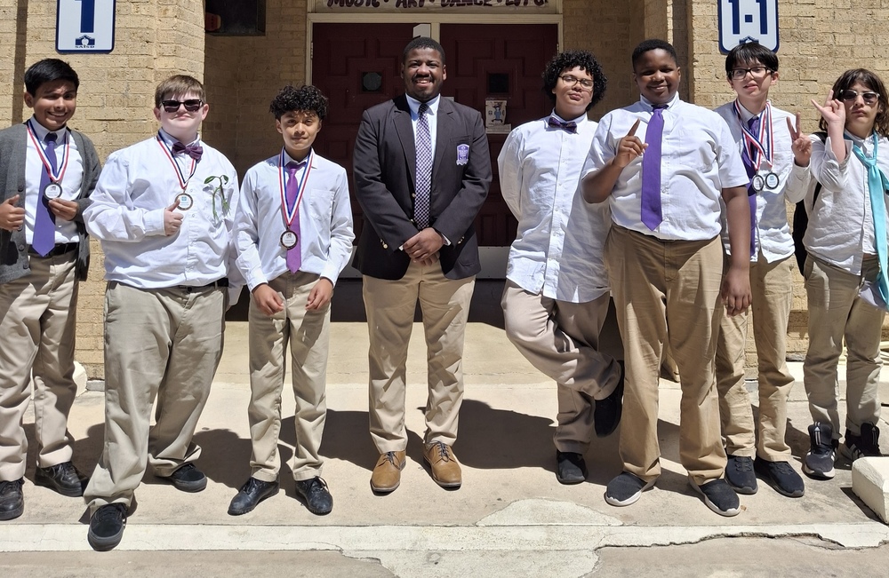 Seven YMLA students and teacher