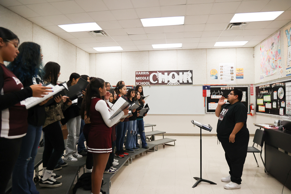 Melchor directs choir
