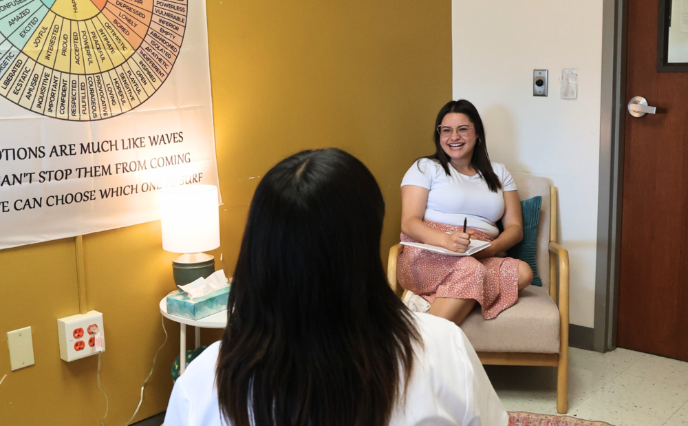 Counselor speaks to student