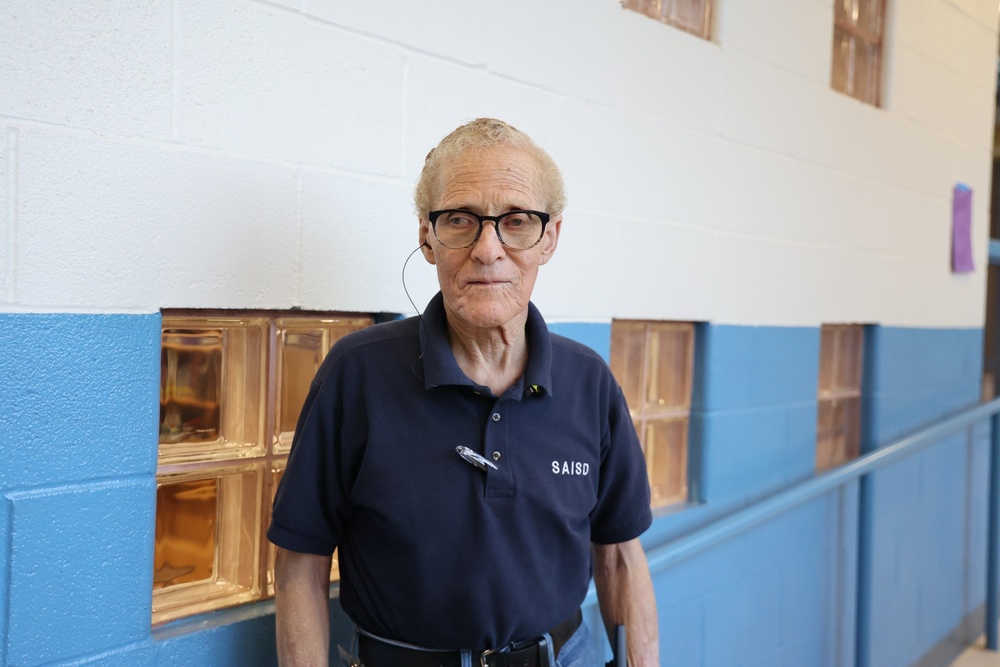 Custodian in hallway