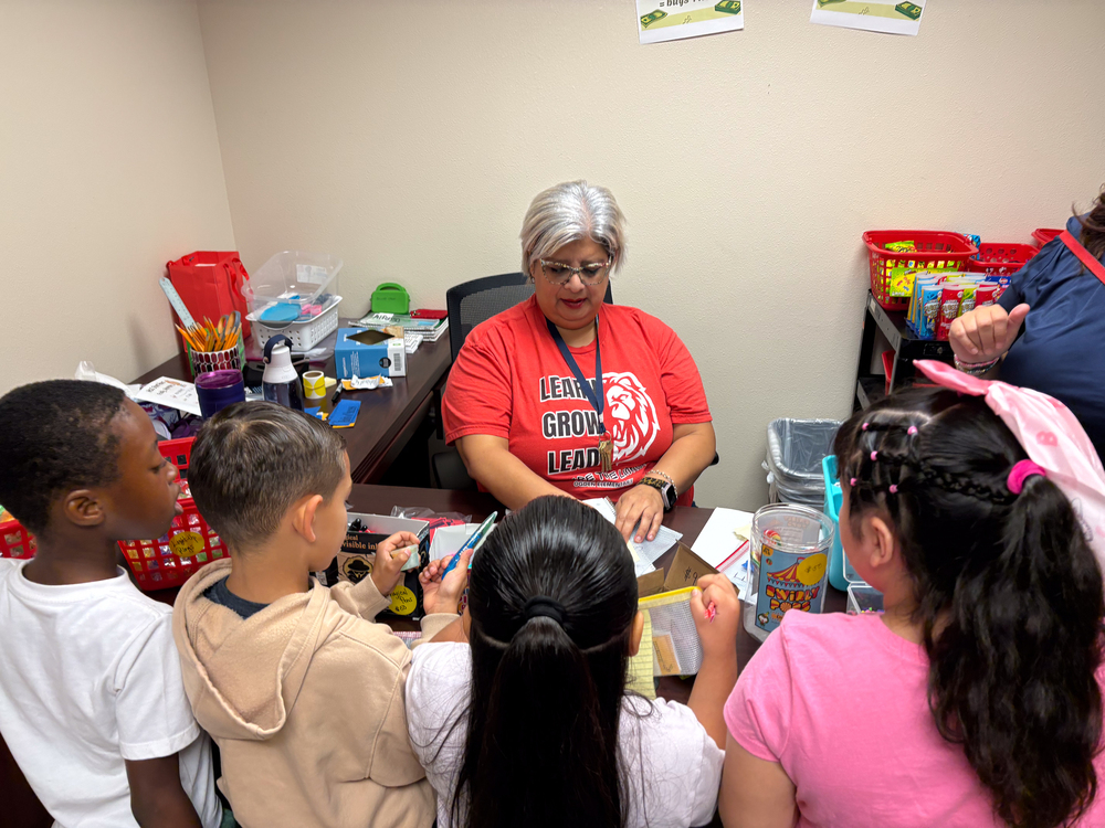 Students purchase items from incentive store