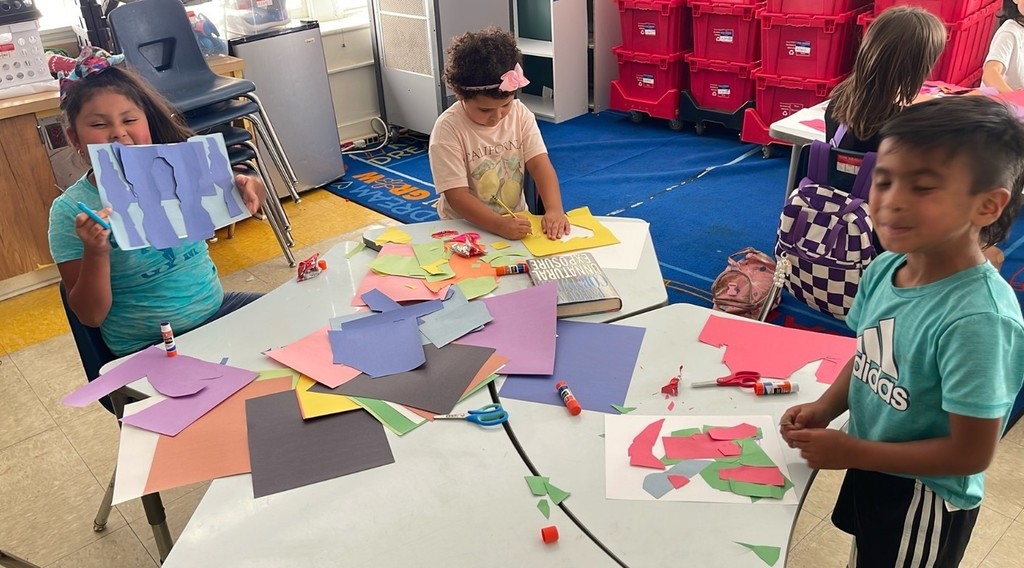 Students engaged in learning and art at summer learning