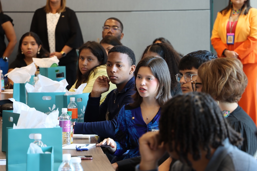 Student group listens to presentation