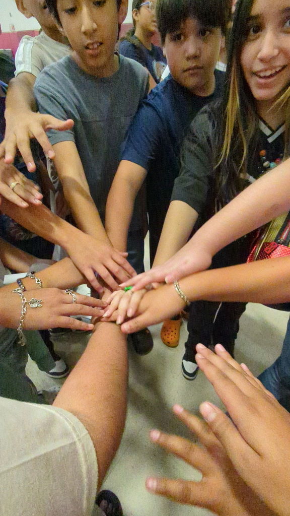 hands in the middle to give a chant.