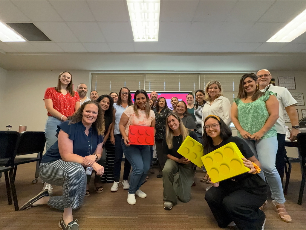 Pictured are 20 staff members who came together to plan the year - the theme is Building Upward & Onward!