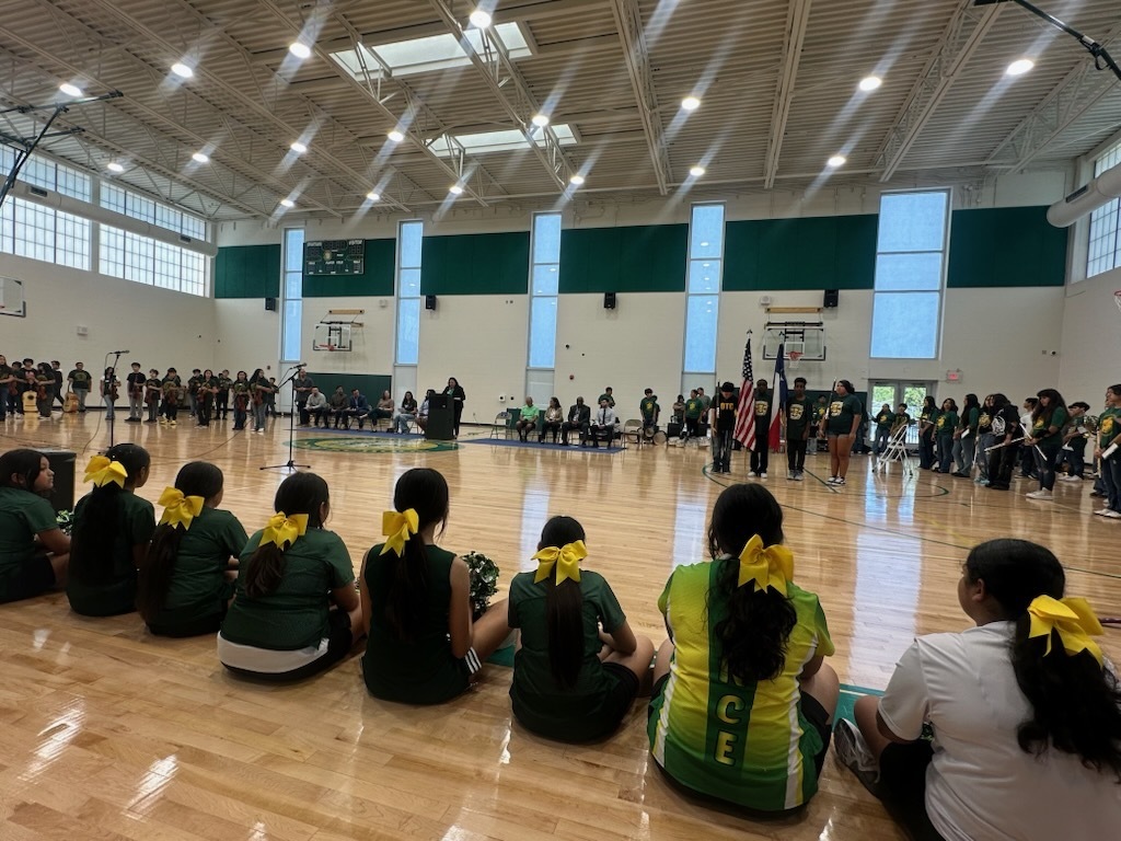 Full gym, cheerleaders