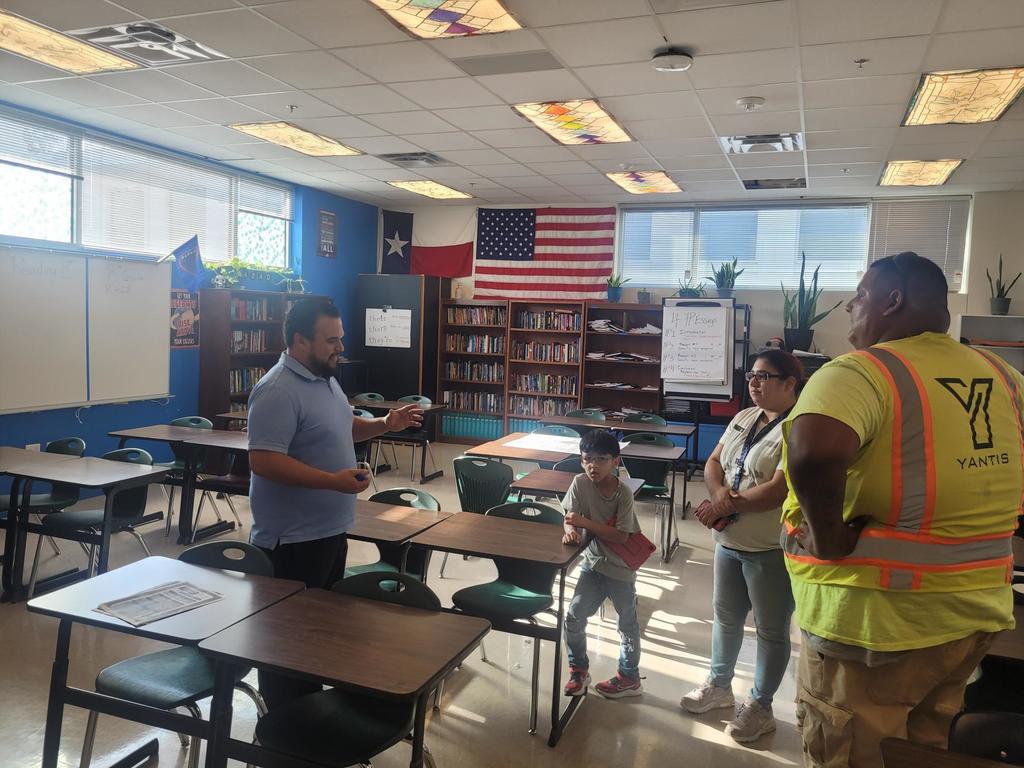 American/Texas  flags in the background