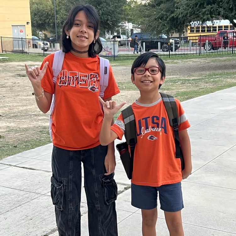 Students sport college shirts.