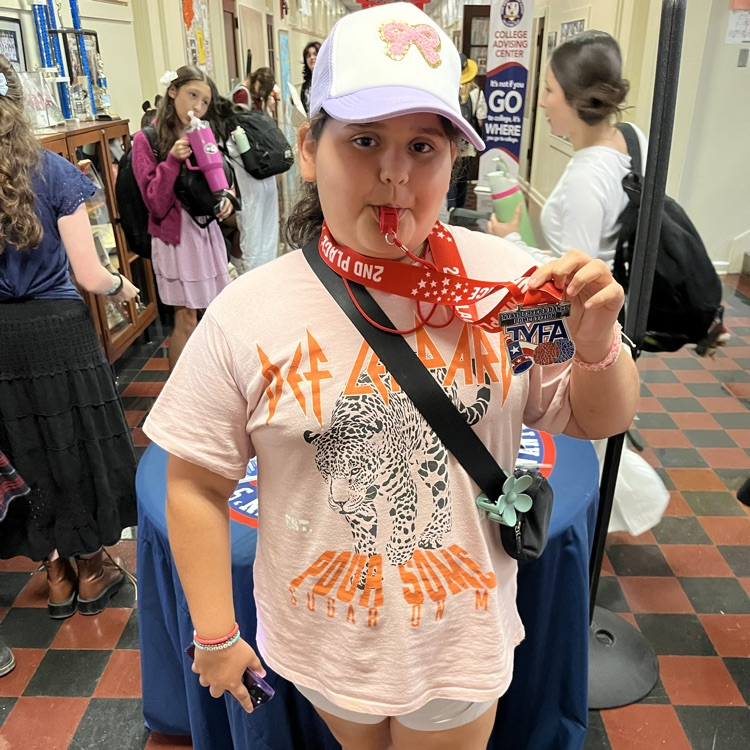 It’s a cheer coach!