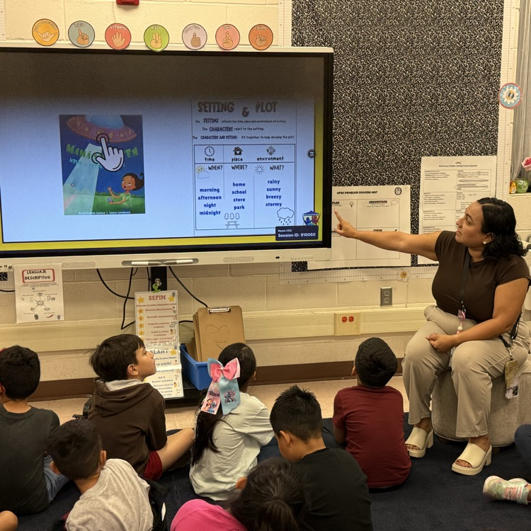 Students learn about plot through relevant story telling.