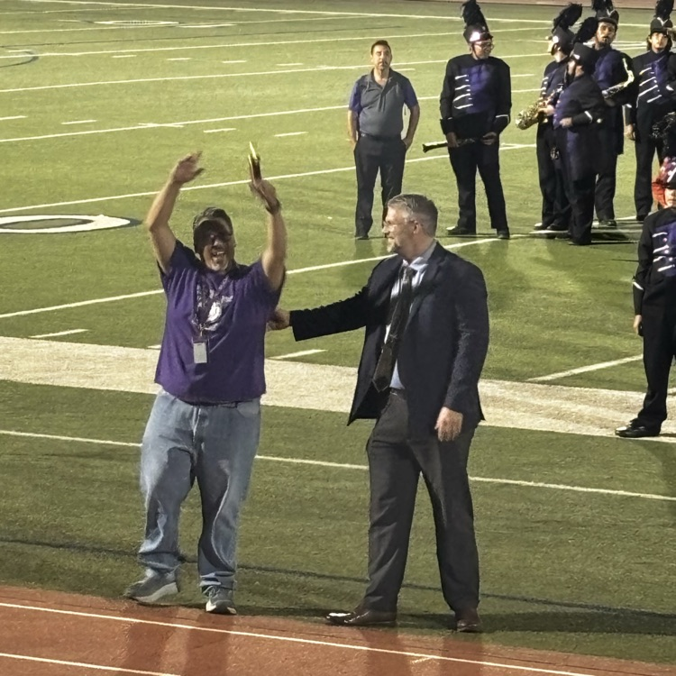 Mr OCampo cheers with the trophy.