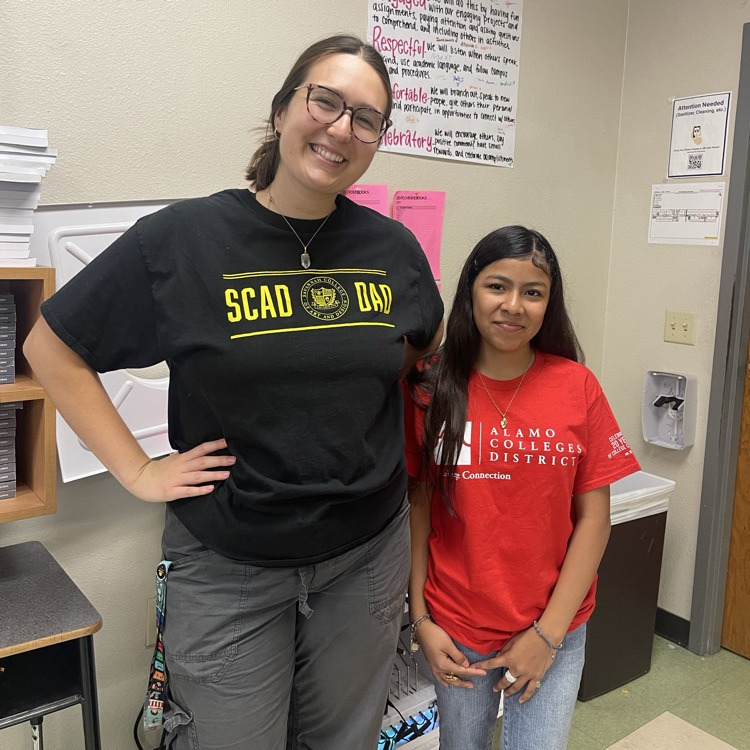 Ms. Goetz, AVID Coordinator, sports college gear.