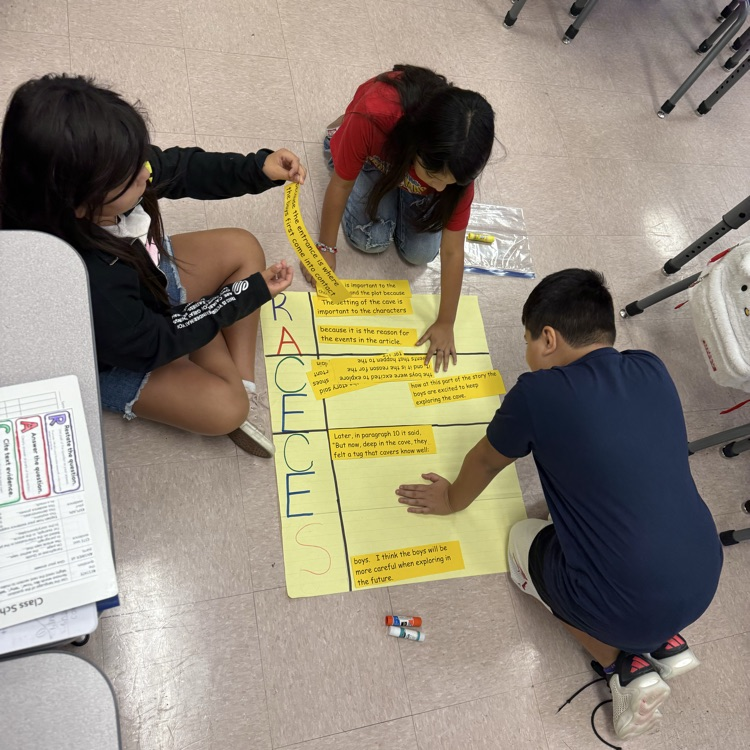 Students work to piece an essay together .