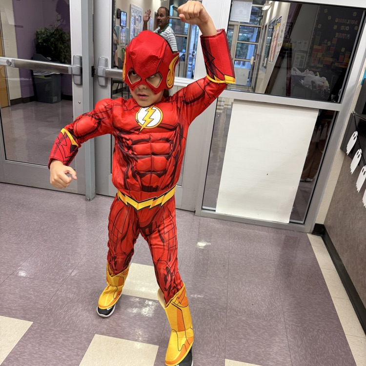 Student dressed up as a superhero for Hero of Kindness day.