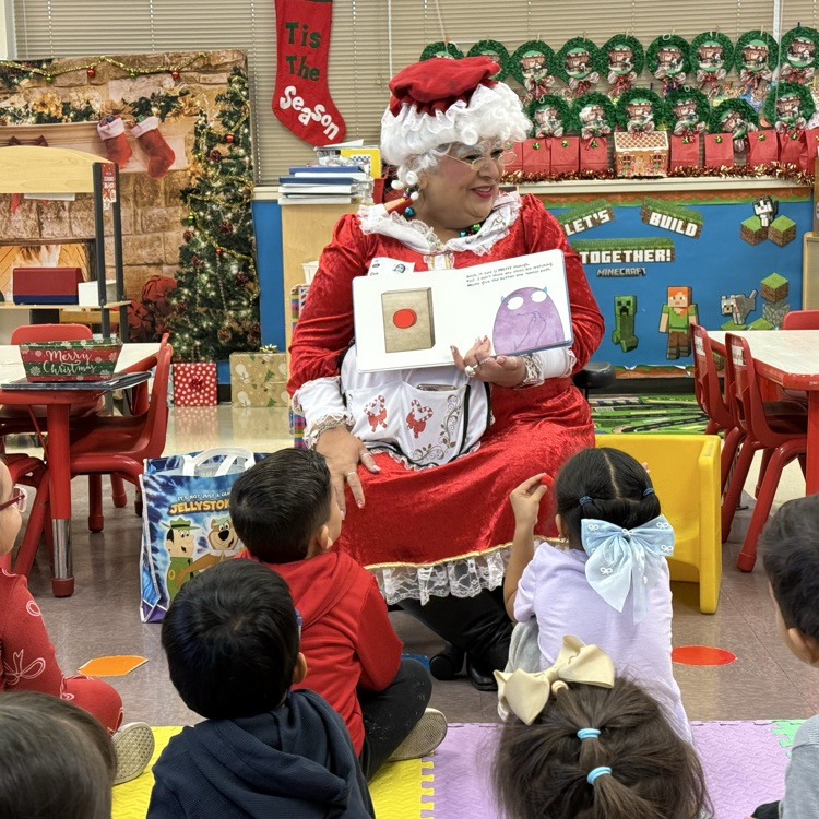 Mrs. Claus reading to classes