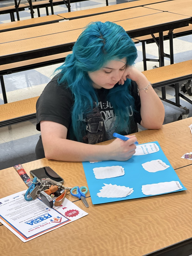 Parents working on their vision boards
