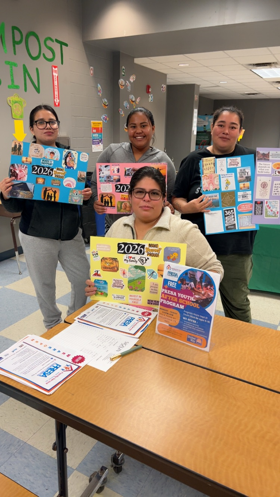 A few parents showing off their vision boards. 