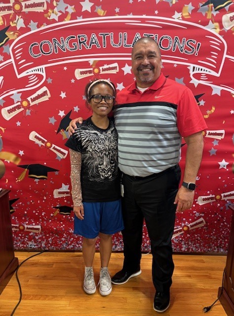 Prestigeous Wilson and Principal Becerra.