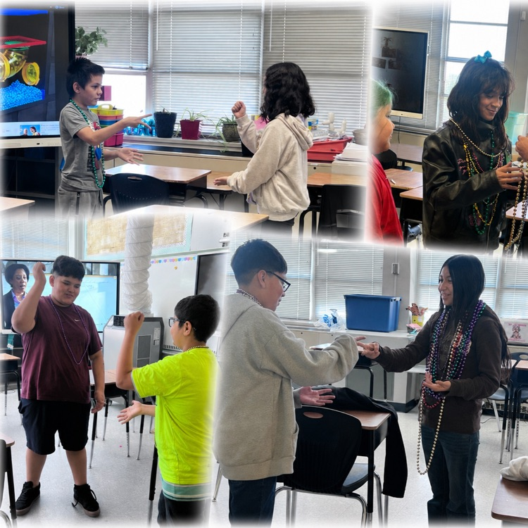 Student playing rock, paper, scissors to become the class winner!
