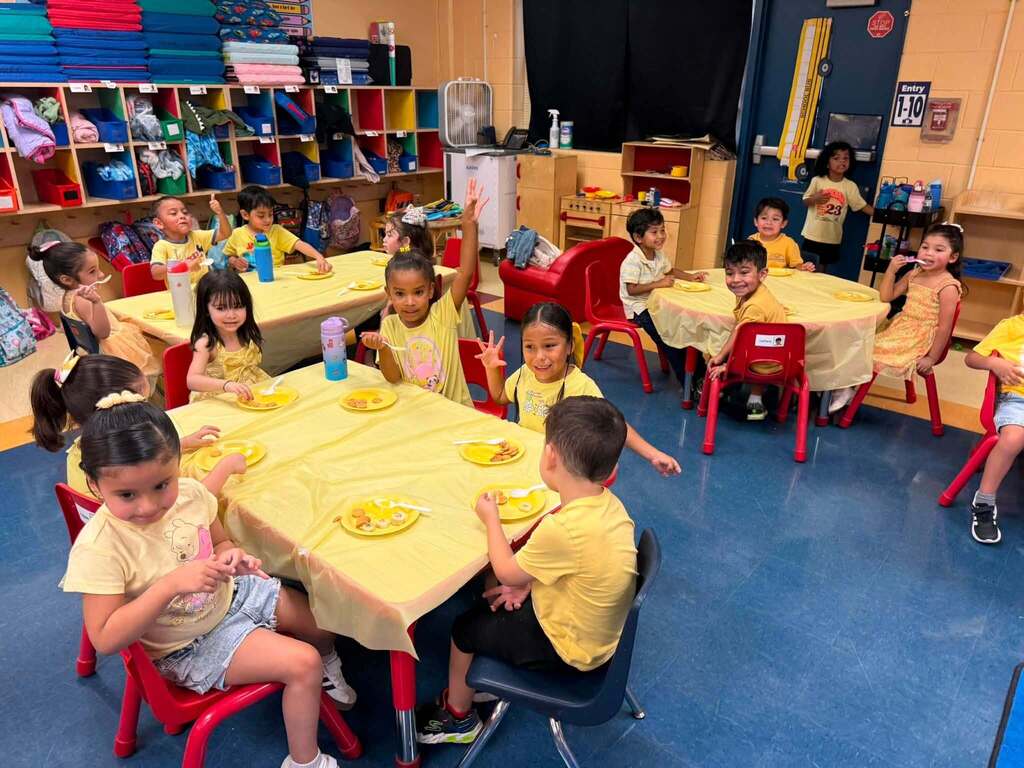 kids dressed in yellow eating and learning about yellow foods